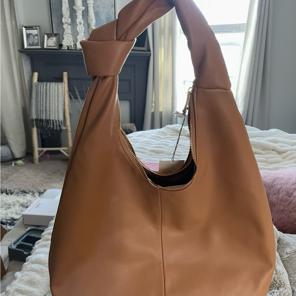 Spacious Tan Hobo Bag with Curved Handle